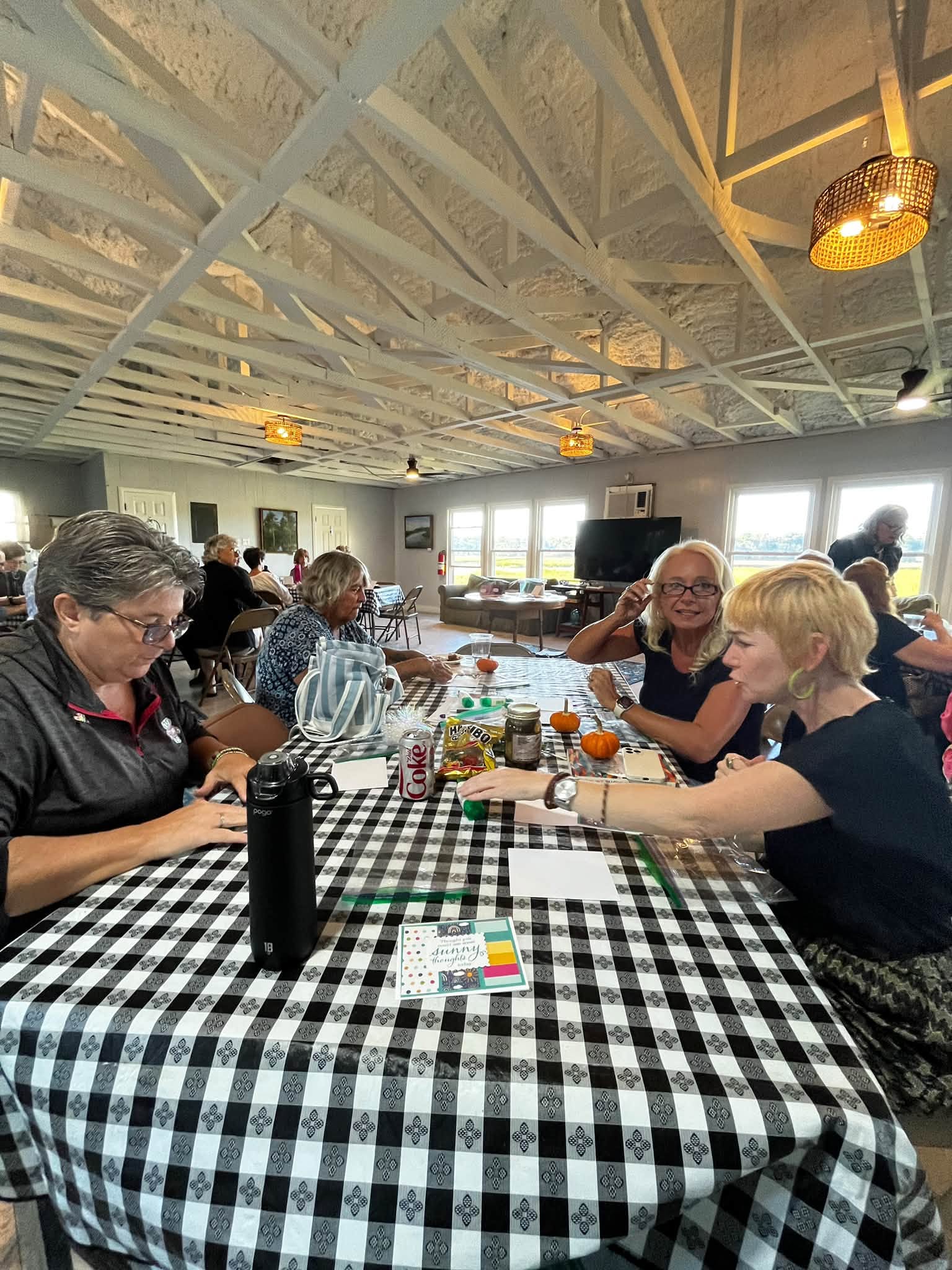 People gathered around a table during an Asbury Memorial Church community event