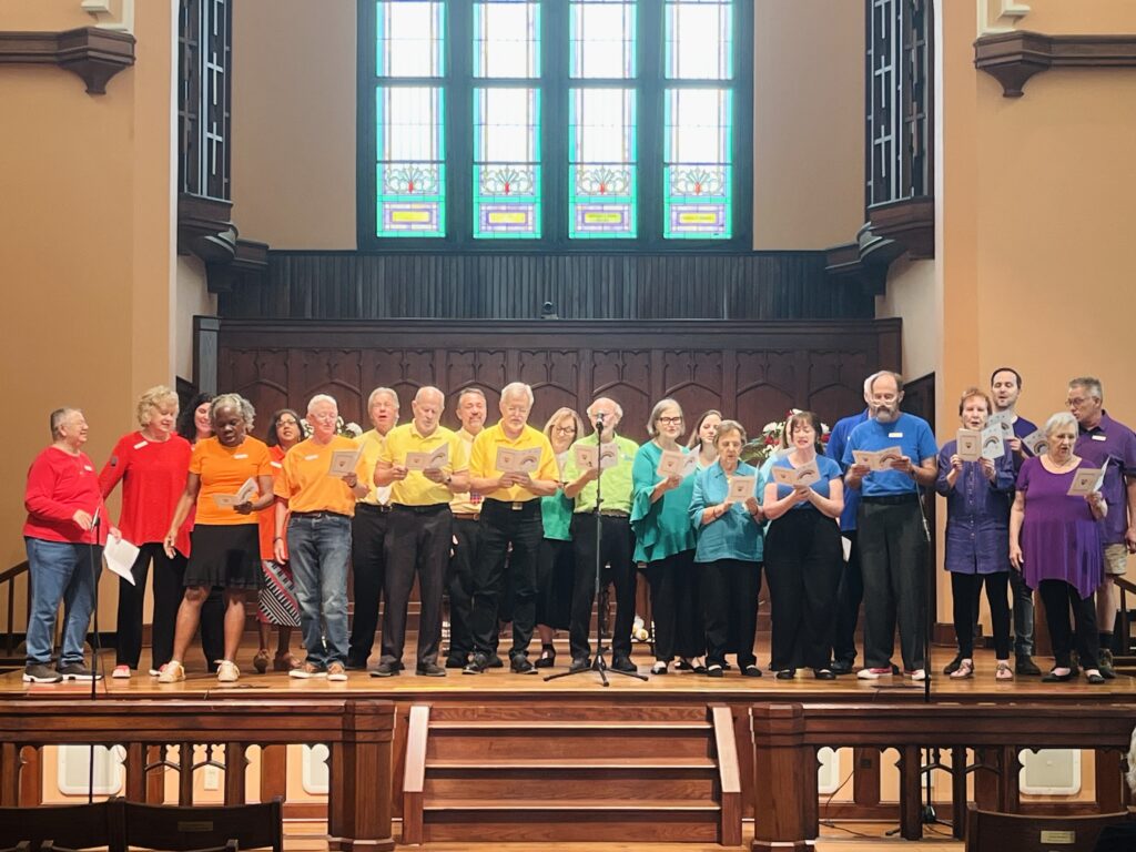 Asbury Memorial Church choir singing together in the sanctuary